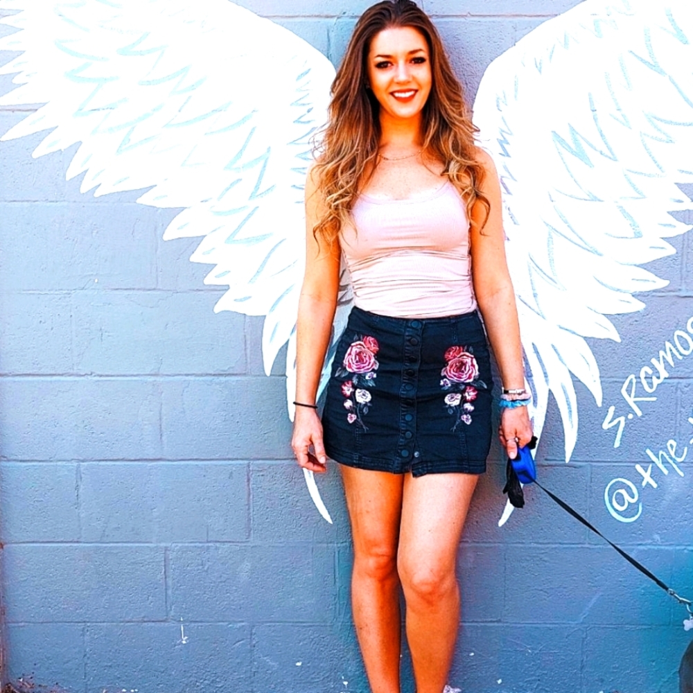 Blacked denim mini skirt with flower embroidery